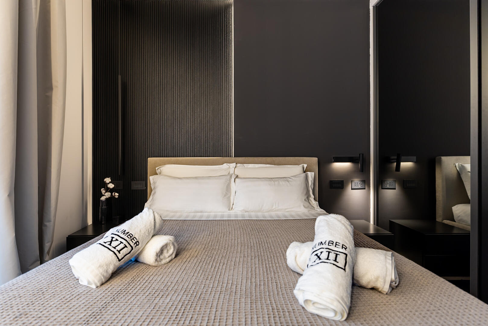 King-sized bed with crisp white linens